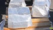 The shipment contained three aluminum blocks, shrink-wrapped and palletized, each weighing approximately 165 pounds.